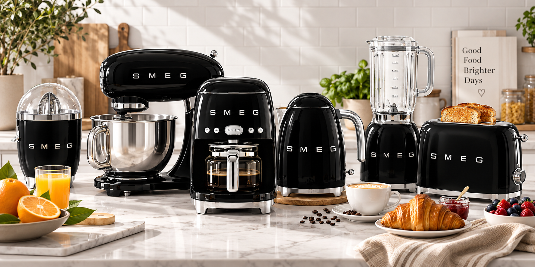 Complete black Smeg retro kitchen collection on a marble worktop